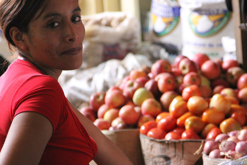 A woman selling fruits abroad.