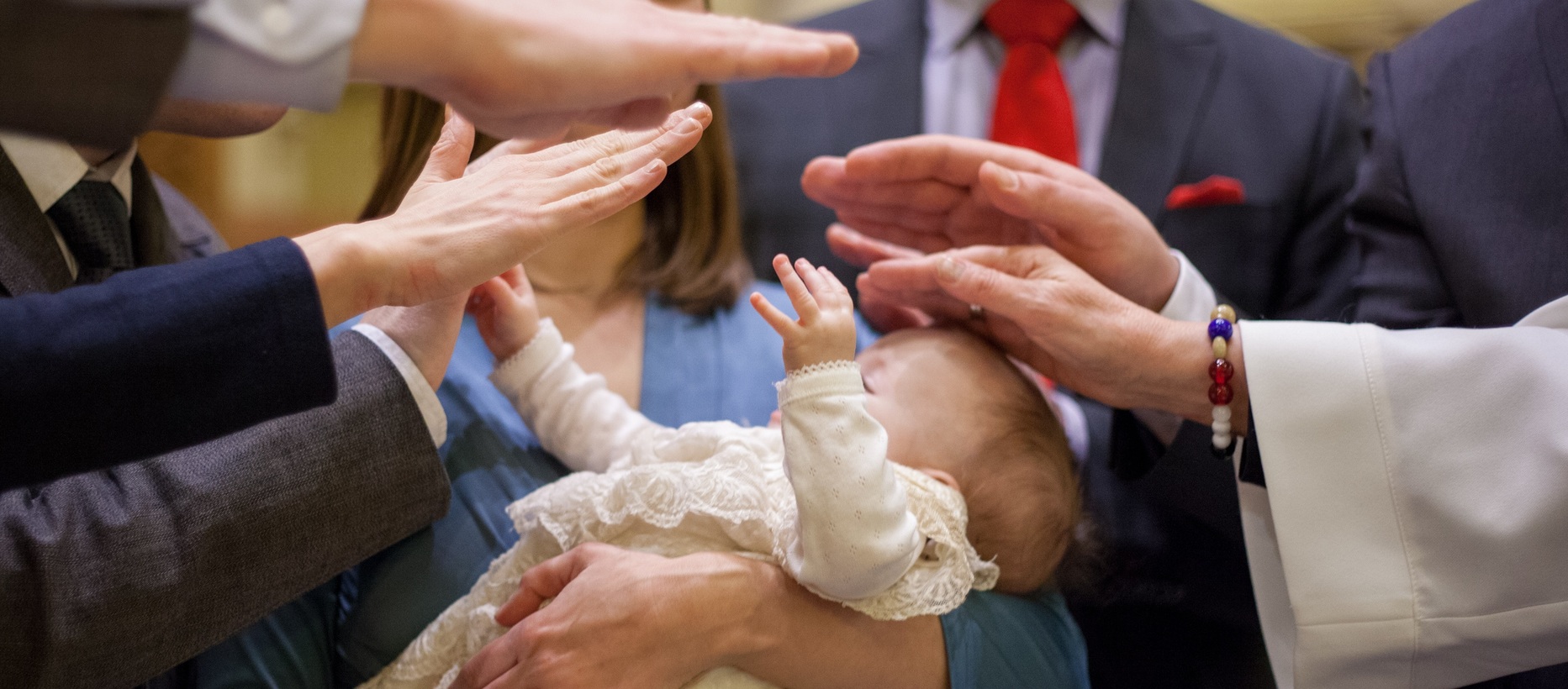 Blessing of a baptised child.