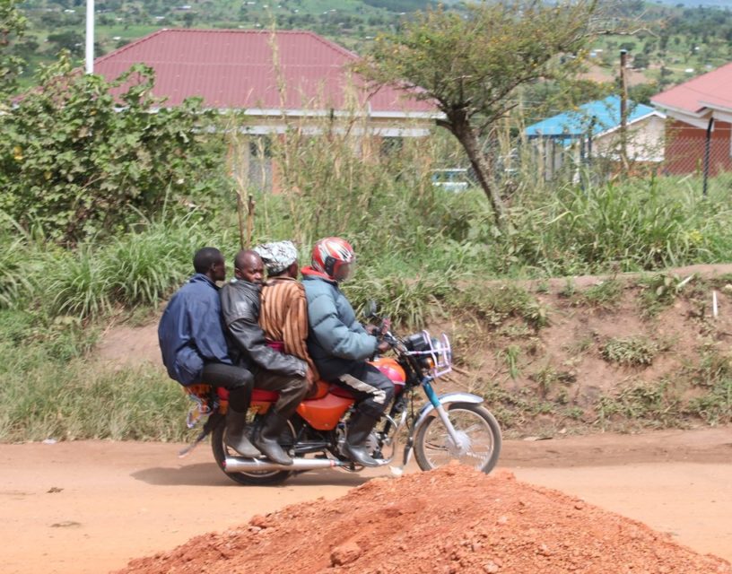 four people on a motorcycle